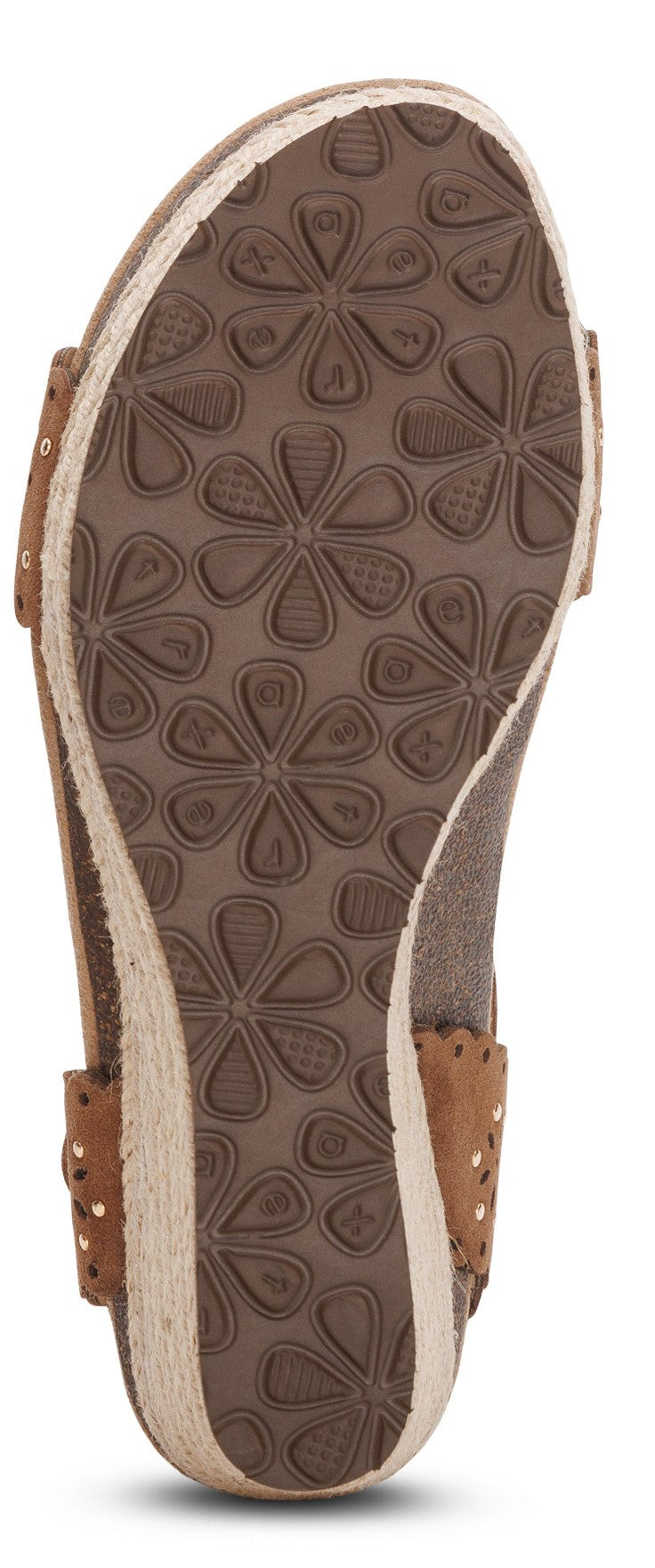 The sole of a women's platform sandal featuring a brown daisy-like tread.