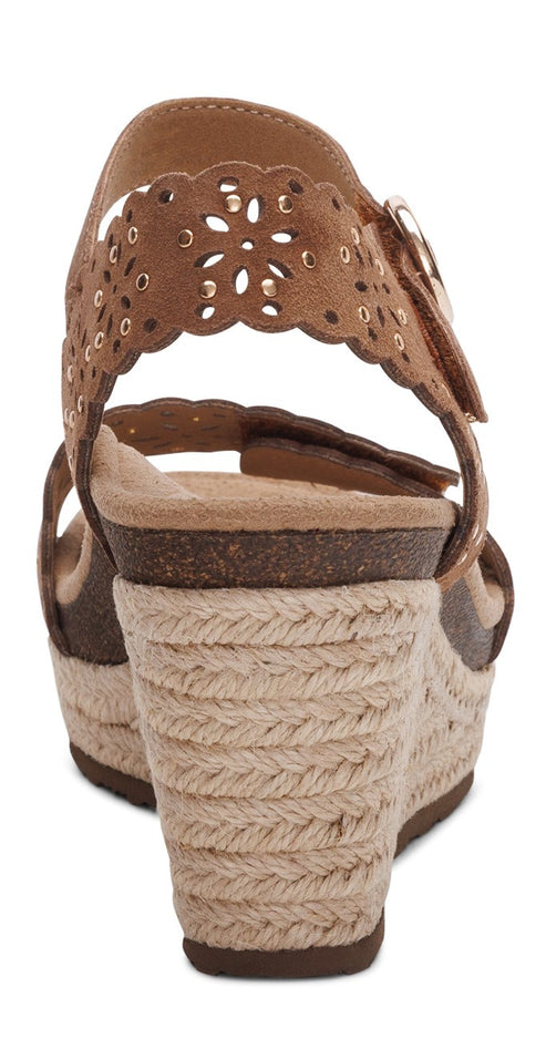 Wedge sandals with jute rope platform, flower cutouts, and ankle strap.