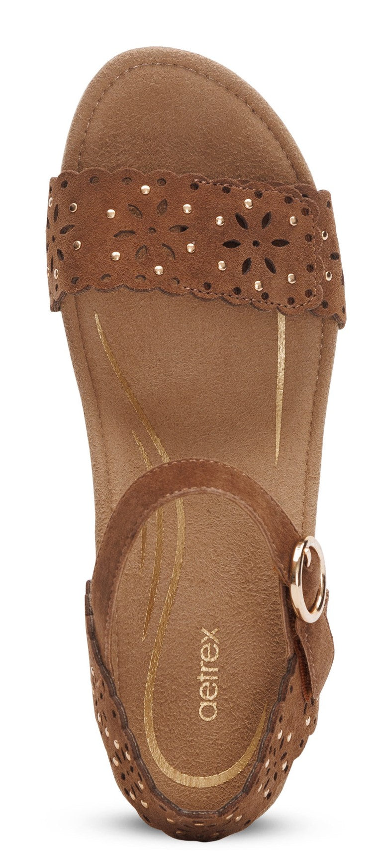 A brown sandal with decorative cutouts and a buckle.