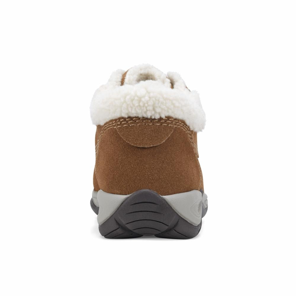 Rear view of brown suede boot with white faux fur trim.
