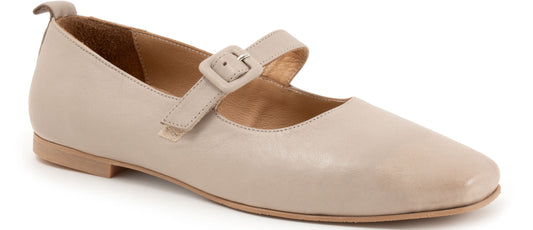 Beige Mary Jane shoe with buckle.