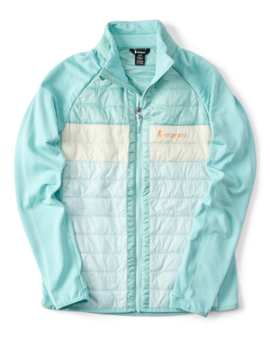 Light blue quilted jacket with white horizontal accents and logo text.