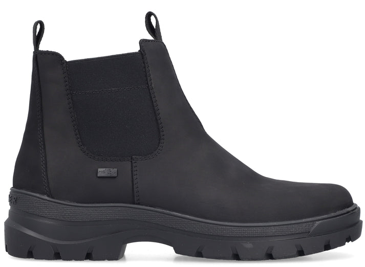 A black, mid-height boot with elastic side panels and a chunky sole.