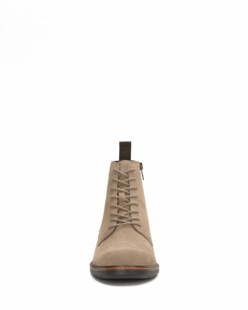 Front view of a light brown suede leather lace-up boot with a zipper.