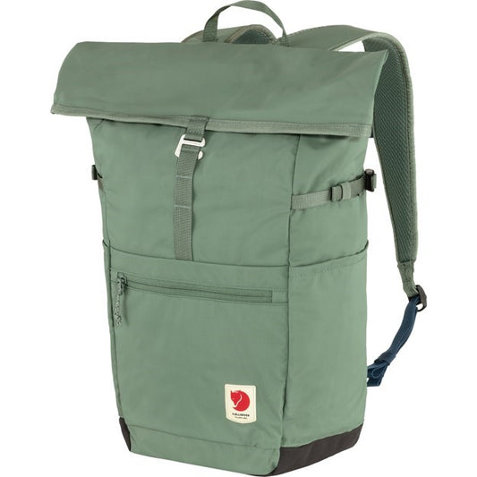 Green roll-top backpack with front zipper pocket and small rectangular logo.