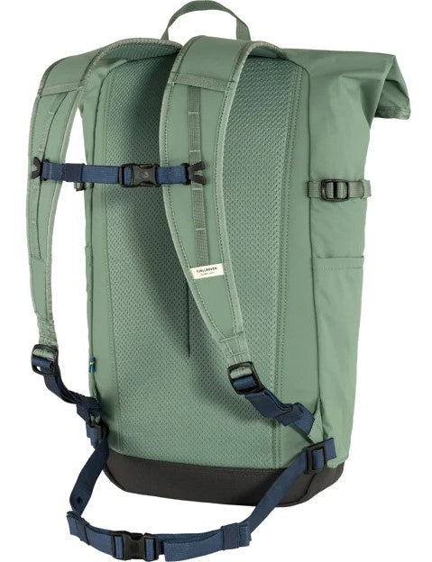 Green backpack with padded straps and mesh back.