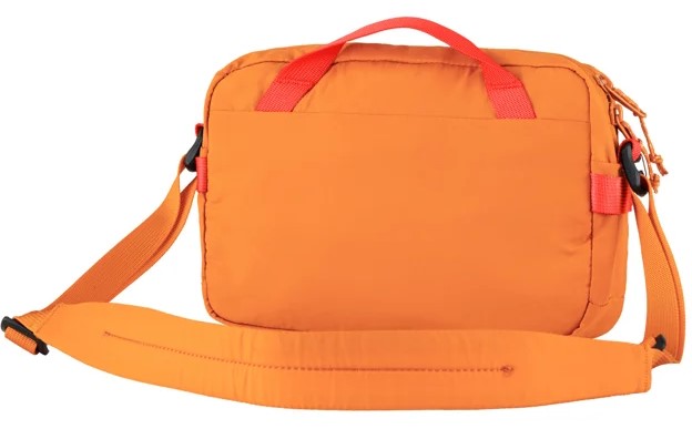 Orange messenger bag with red handle and shoulder strap.