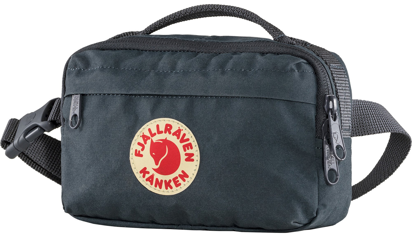 Dark gray fanny pack with circular red and beige logo.