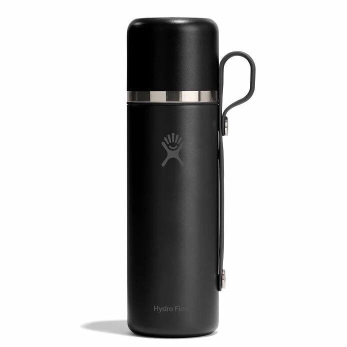 Black water bottle with a silver band around the neck and handle on the side, logo on the front.