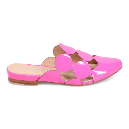 A shiny, fuchsia-colored slide with a pointed toe and circular cutouts along the top.