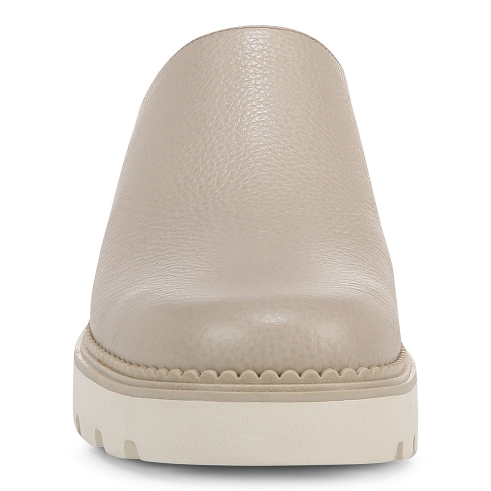 Beige leather clog with thick, white sole.
