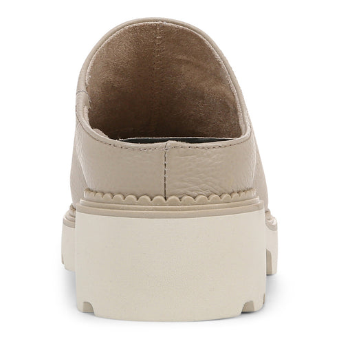 Beige leather mule with a thick, ridged white platform sole.