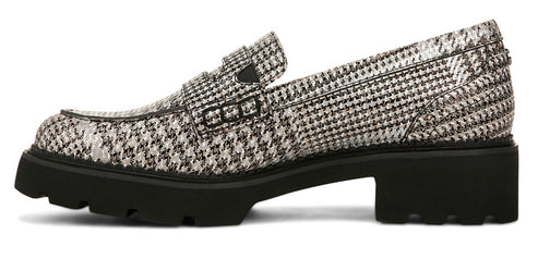 A black and white houndstooth heeled loafer.