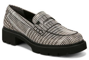 Houndstooth pattern loafer with a black lug sole and stacked heel.