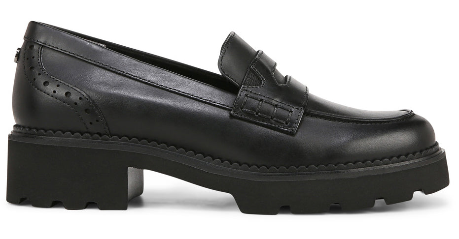 Black leather penny loafer with a chunky lug sole and block heel.