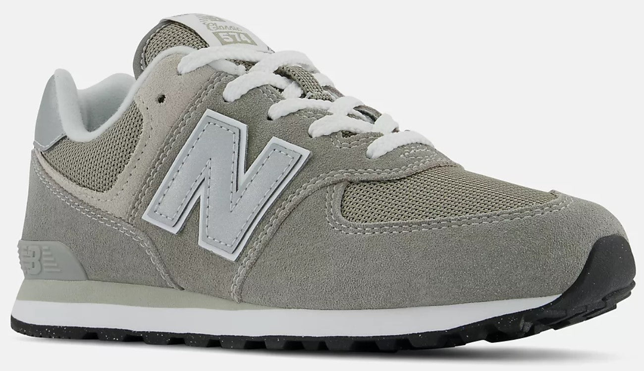 Gray shoe with an "N" logo and white laces.