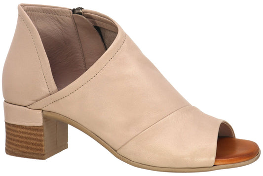 Tan leather peep-toe block heel shoe with side cutouts.