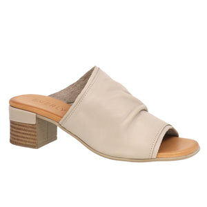 Beige heeled slide sandal with a gathered upper.