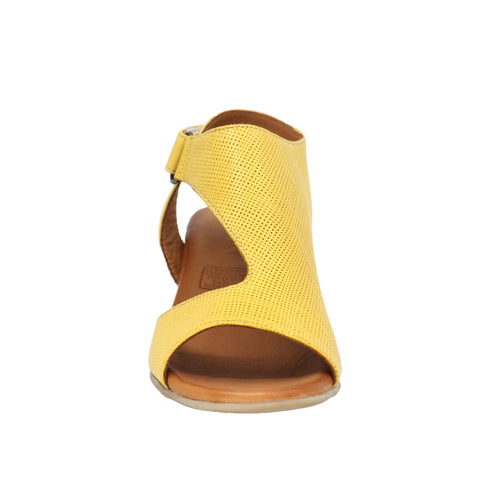 Yellow perforated leather sandal with angled asymmetric cutout and brown sole.