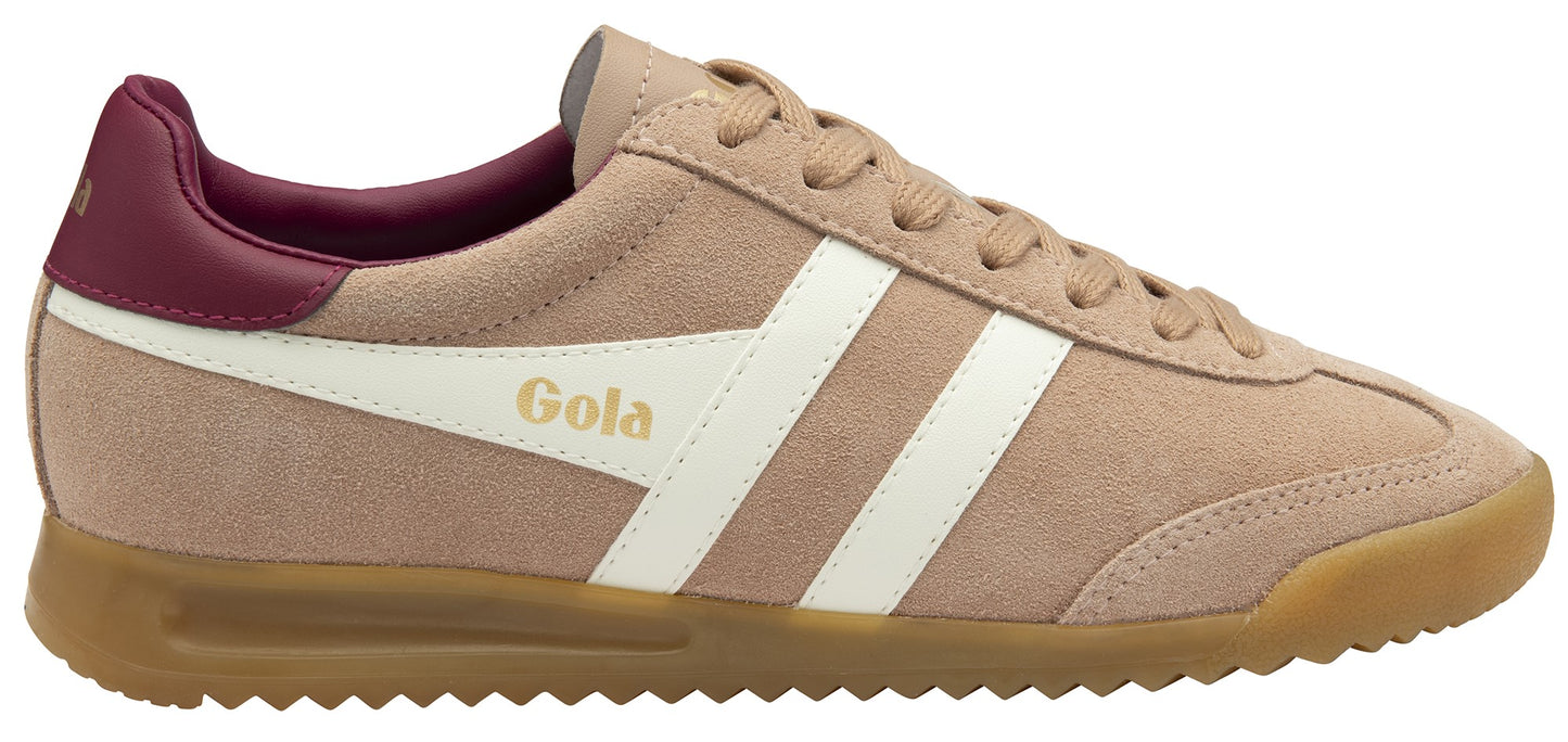 A tan sneaker with a white stripe and a dark red heel.