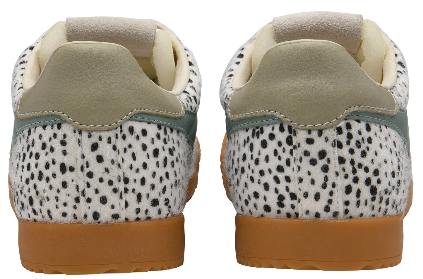 Back view of two sneakers with white and black spotted print, light green heel counter, beige heel and gum sole.