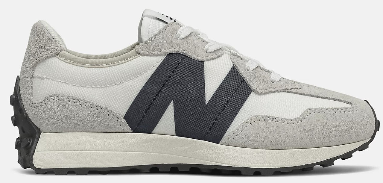 A grey and white sneaker with a large 'N' logo on the side.