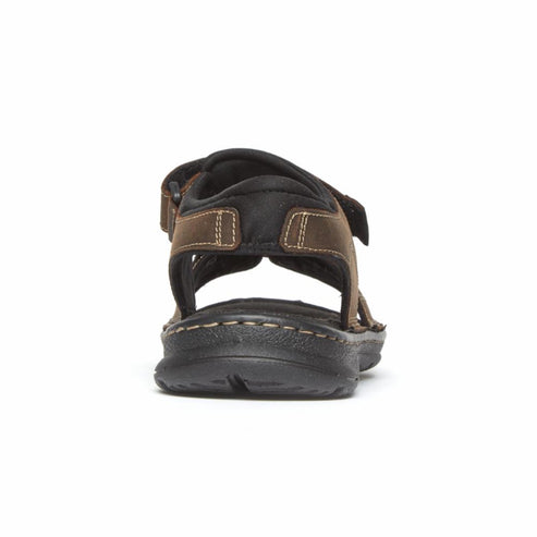 Brown sandal with straps, seen from the rear.