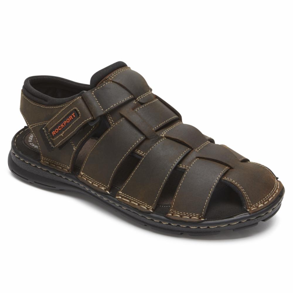 Brown leather sandal with multiple straps and a ROCKPORT logo on the side.