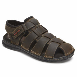 Brown leather fisherman sandal with black sole and ROCKPORT logo.
