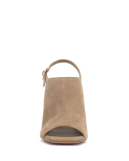Tan peep-toe mule with ankle strap and block heel.