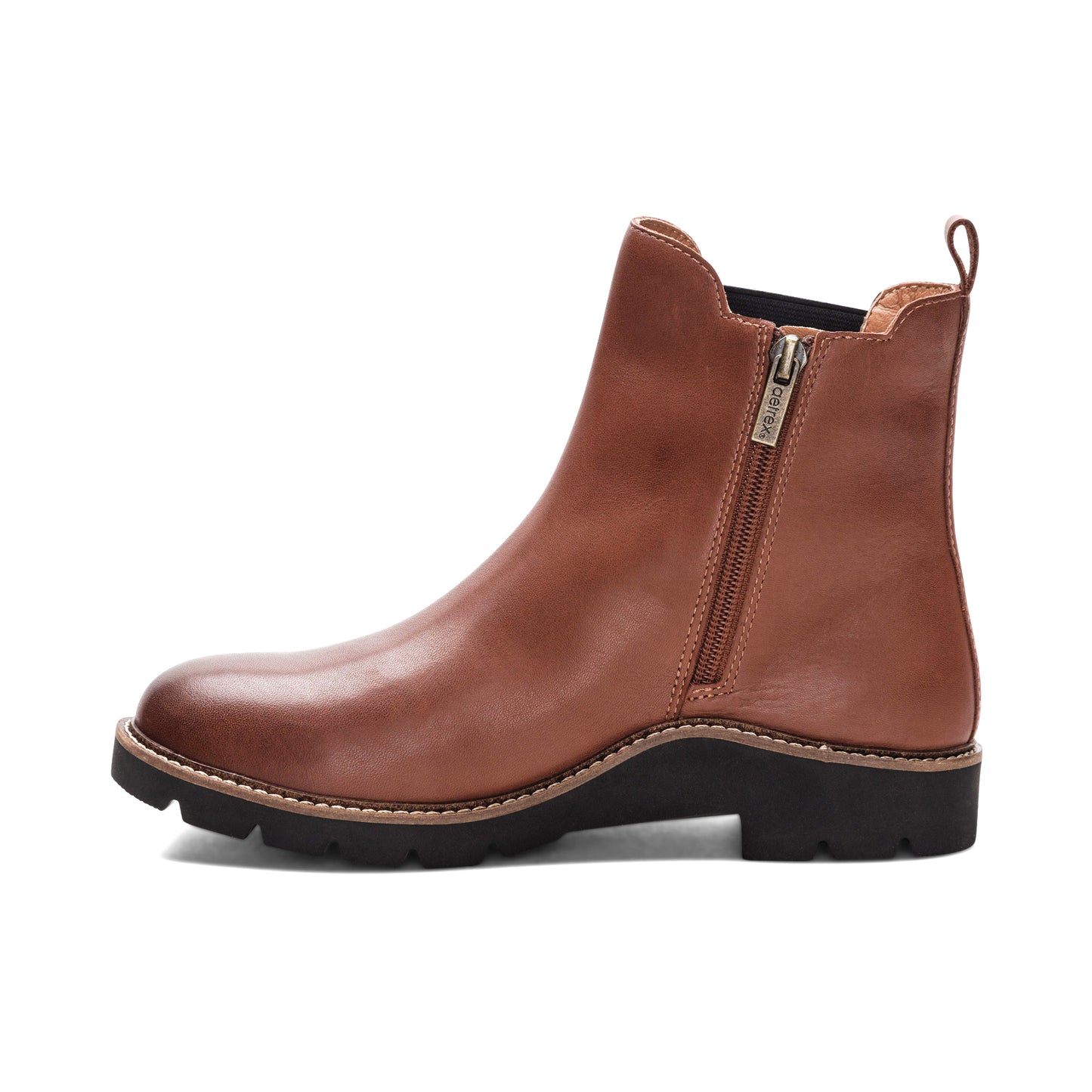 A tan leather ankle boot with a side zipper and a black sole.