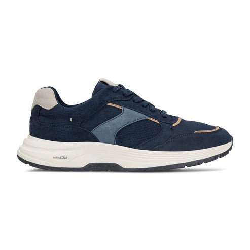 Navy blue suede sneaker with a beige heel and white sole.