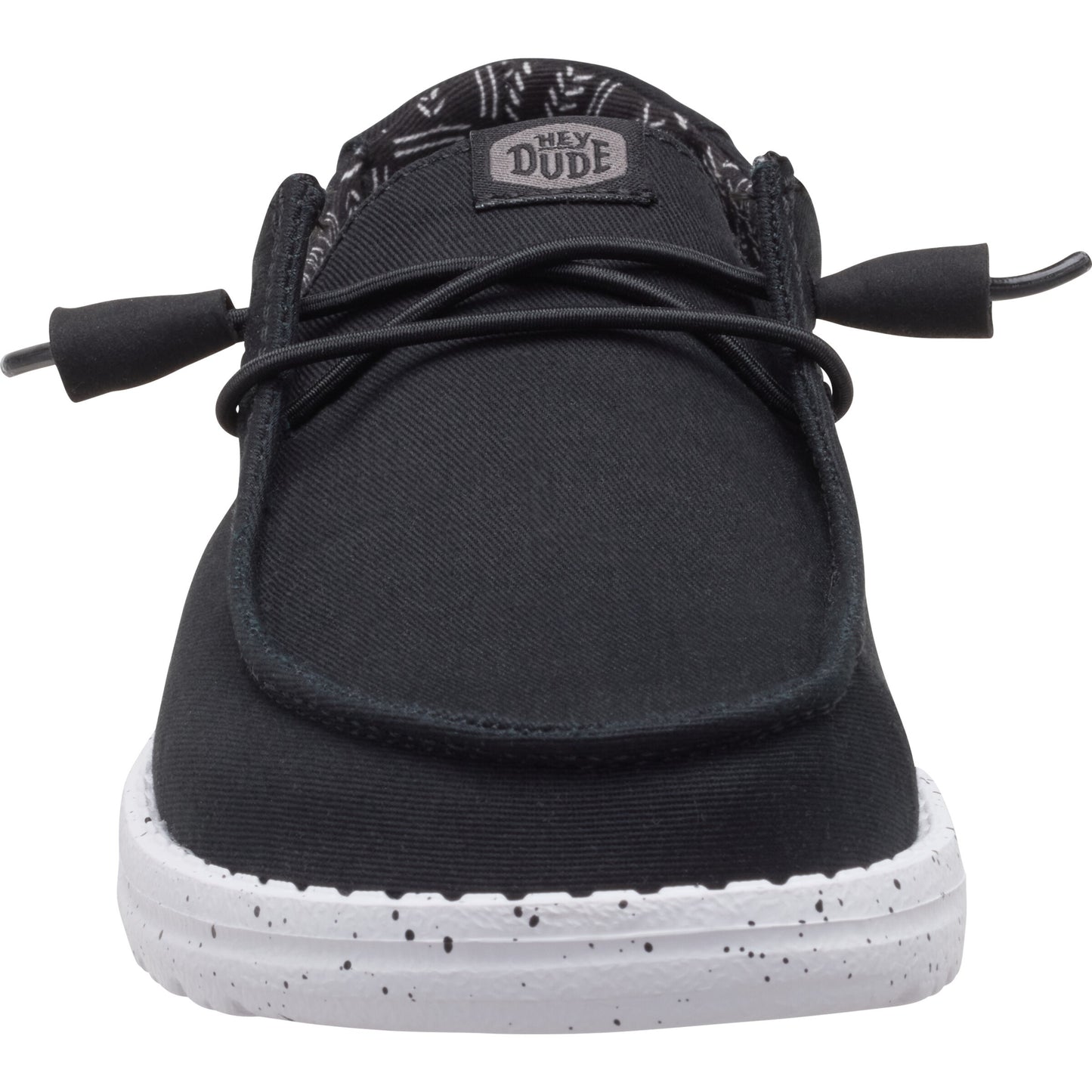 Black slip-on shoe with elastic laces, light sole and patterned interior.