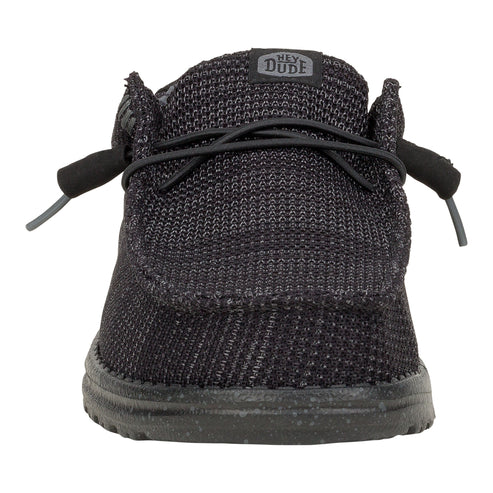Knit-textured, black slip-on shoe with laces.