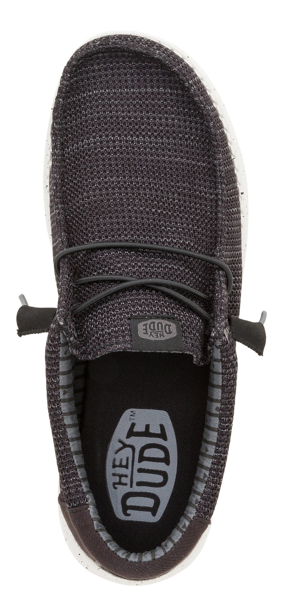 Overhead view of a grey slip-on sneaker with laces.