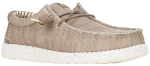 A tan slip-on shoe with a textured, knit-like fabric upper, a white speckled sole, and decorative thin brown laces.