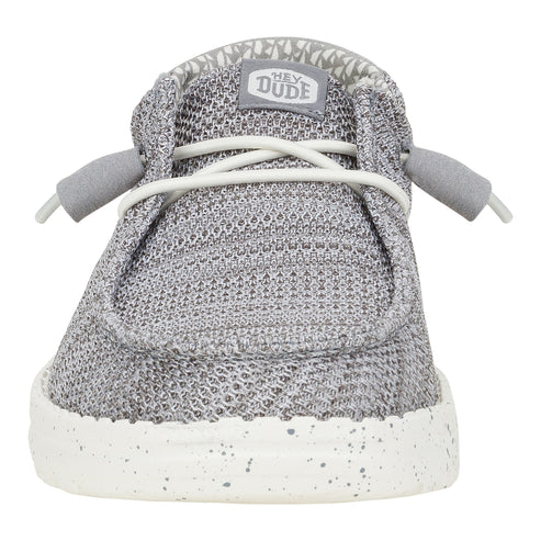 Gray knit slip-on shoe with white laces and sole.