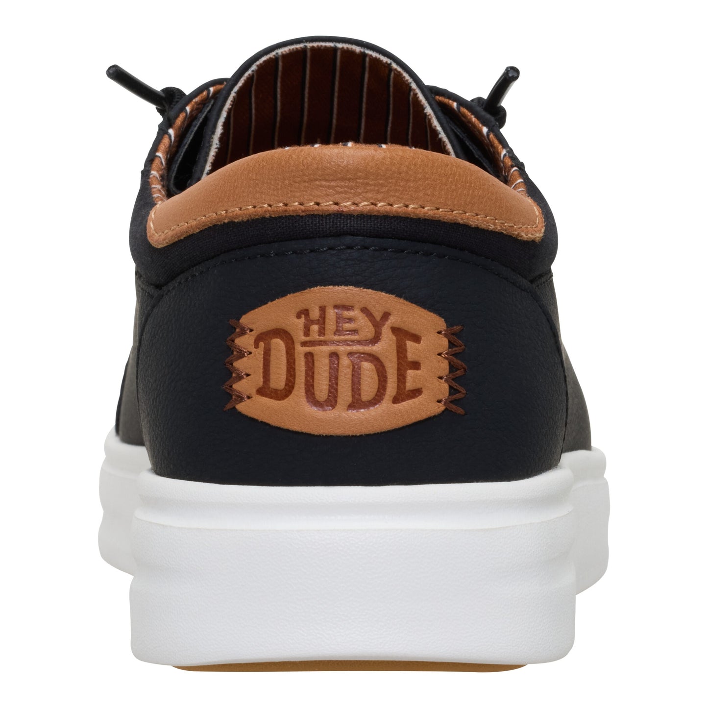 Black slip-on shoe with white sole and brown accents, featuring a patch with 'HEY DUDE' on the heel.