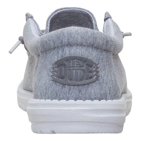 Gray slip-on shoe featuring a white sole with 'THE DUDE' logo.