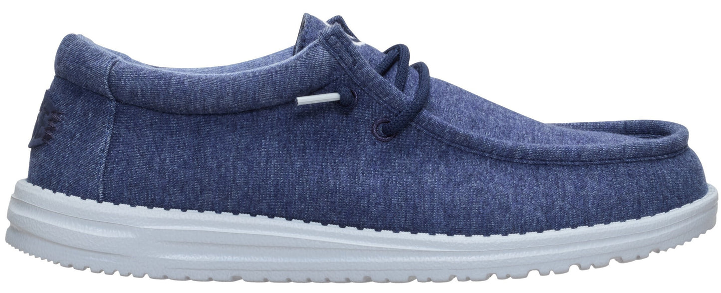 A slip-on blue shoe with white sole.