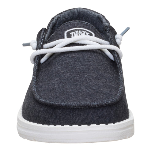 Gray slip-on shoe with white laces and white sole.