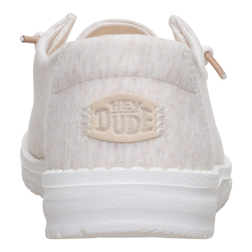 Off-white casual shoe with visible "HEY DUDE" logo.