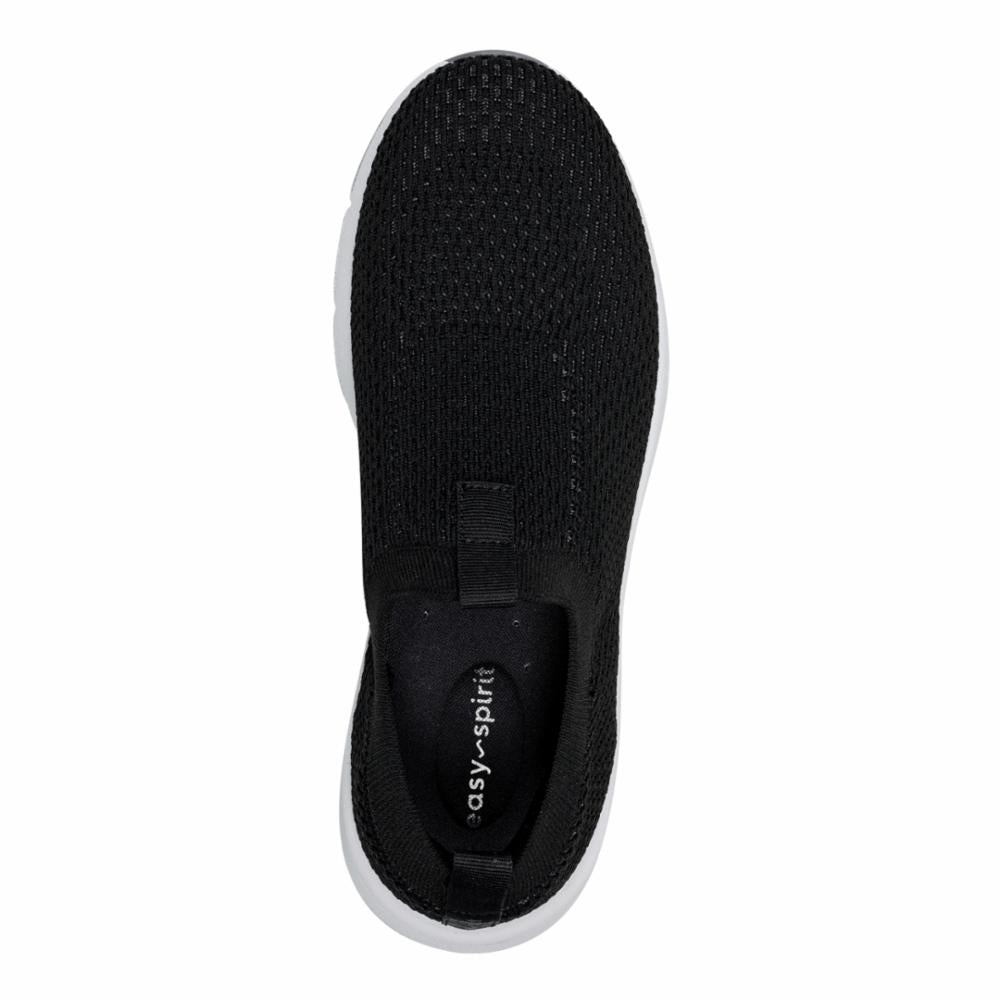 Top-down view of a black slip-on sneaker with a knit upper and a white sole.