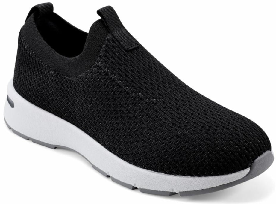 Black slip-on sneaker with a white sole.