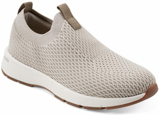 Beige slip-on sneaker with knit upper and white sole.