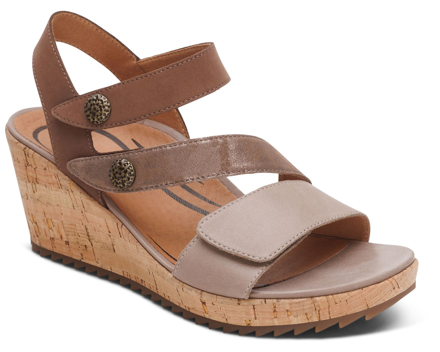 Wedge sandal featuring a brown cork wedge heel and color-blocked leather straps with decorative buttons.