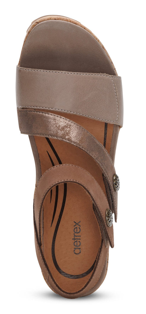 Aetrex brown sandals with straps.