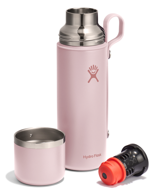 Pink metal water bottle with lid, and filter attachment.