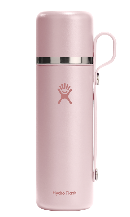 Pink water bottle with handle and logo.