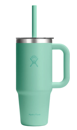 Tall, mint-green, stainless steel mug with handle, metal lid, and straw